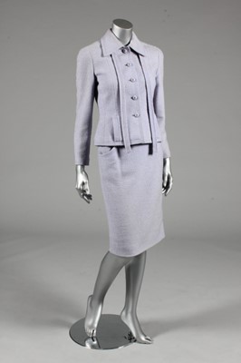 Lot 23 - A Chanel lavender wool suit, 1990s, boutique...