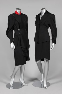 Lot 386 - A Thierry Mugler black wool suit, circa 1990,...