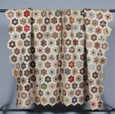 Lot 399 - An un-finished patchwork coverlet, English...