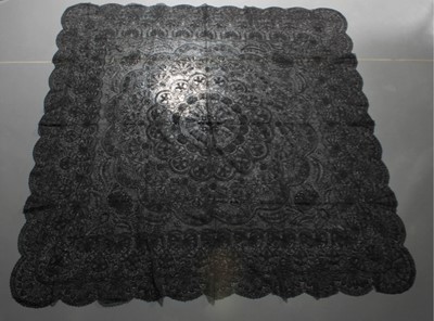 Lot 409 - A Maltese black silk bobbin lace shawl, circa...