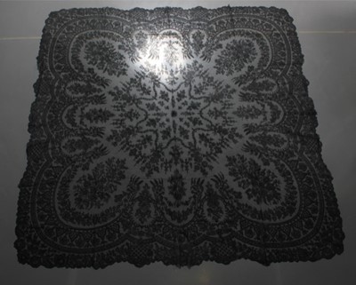 Lot 410 - A Chantilly lace shawl, circa 1860, with...