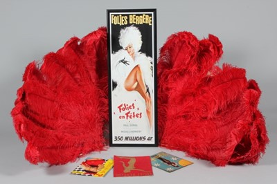 Lot 425 - Two scarlet ostrich feather burlesque fans,...