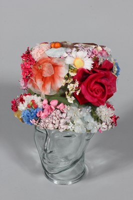 Lot 429 - A Schiaparelli floral hat, late 50s-early 60s,...