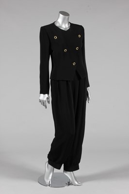 Lot 446 - An Yves Saint Laurent black velvet jacket,...