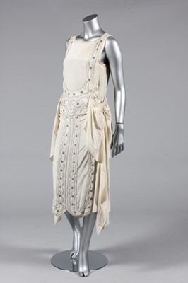 Lot 301 - An beaded ivory chiffon flapper dress with...