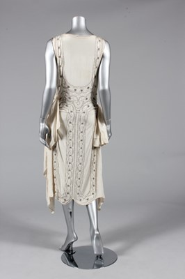 Lot 301 - An beaded ivory chiffon flapper dress with...