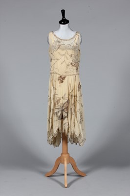 Lot 301 - An beaded ivory chiffon flapper dress with...