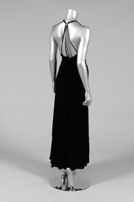 Lot 305 - A black velvet evening gown, late 1930s, with...