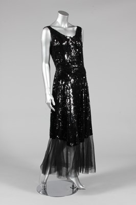 Lot 306 - A black sequined evening gown, circa 1930, the...