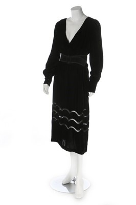 Lot 201 - A Christian Dior black velvet evening dress,...