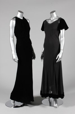 Lot 311 - A black velvet bias cut evening gown, circa...