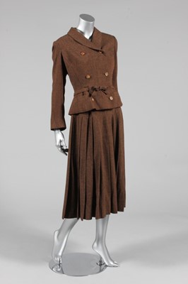 Lot 320 - A Christian Dior brown and black wool suit,...