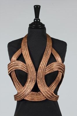 Lot 322 - An unusual halterneck bodice made from plaited...