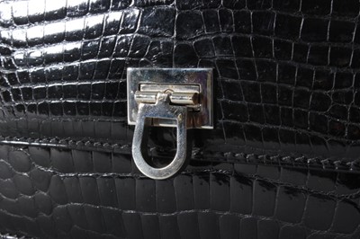 Lot 23 - A Gucci black crocodile handbag, late 1960s,...