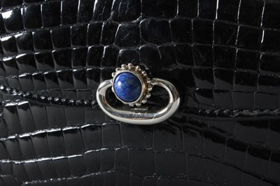 Lot 21 - A Gucci black crocodile handbag, late 1960s,...