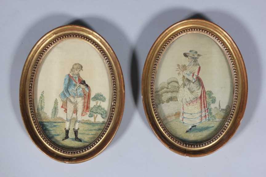 Lot 52 - A pair of embroidered and painted silk...