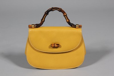 Lot 78 - A Gucci leather 'bamboo' handbag, 1990s,...