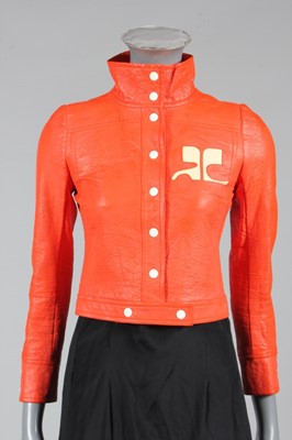 Lot 101 - An Andre Courreges orange vinyl jacket, circa...