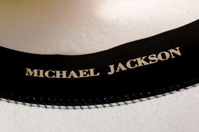 Lot 59 - Michael Jackson's white felt Fedora, signed to...