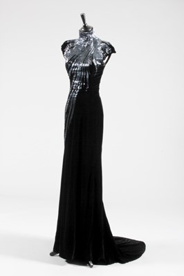 Lot 281 - An Alexander McQueen black velvet and bugle...