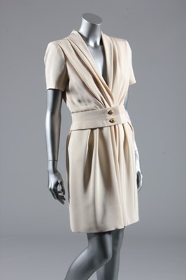 Lot 267 - An Yves Saint Laurent couture ivory silk crpe...