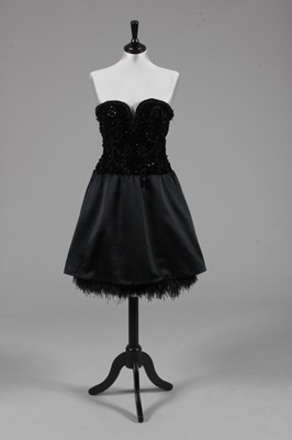 Lot 158 - An Hubert de Givenchy couture black velvet and...