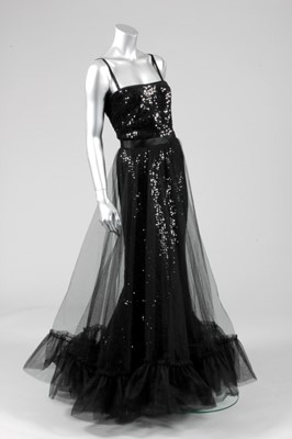 Lot 254 - An Yves Saint Laurent black sequined and tulle...