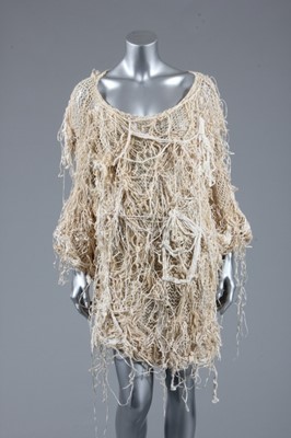 Lot 204 - A Comme des Garçons ivory tousled knit tunic...