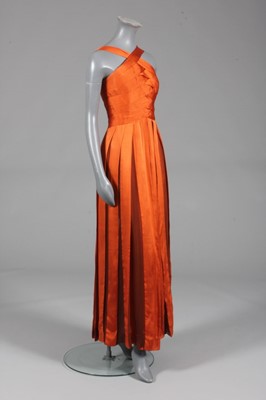 Lot 264 - A Victor Edelstein burnt orange satin ribbon...