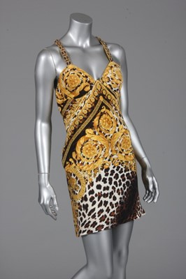 Lot 270 - A Gianni Versace leopard and baroque print...