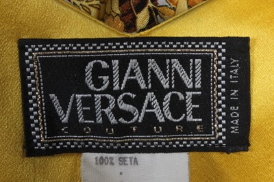 Lot 270 - A Gianni Versace leopard and baroque print...