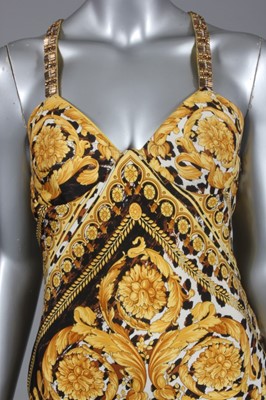 Lot 270 - A Gianni Versace leopard and baroque print...