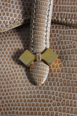 Lot 19 - A Gucci tan lizard handbag, late 1960s,...