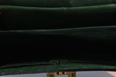 Lot 6 - An Hermès dark green crocodile 'Pascal' bag,...