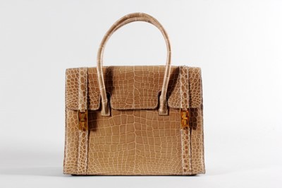 Lot 8 - An Hermès ficelle crocodile 'Drag' bag, late...