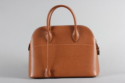 Lot 13 - A fine Hermès tan leather 'Bolide', 1995, Y...