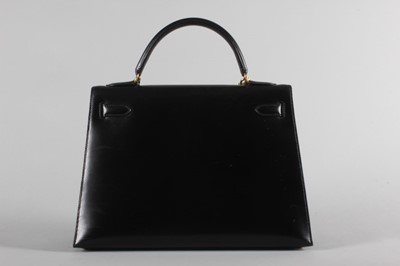 Lot 7 - A fine Hermès black leather Kelly bag, 1995,...