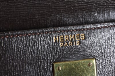 Lot 22 - An Hermès dark brown leather Kelly bag, late...