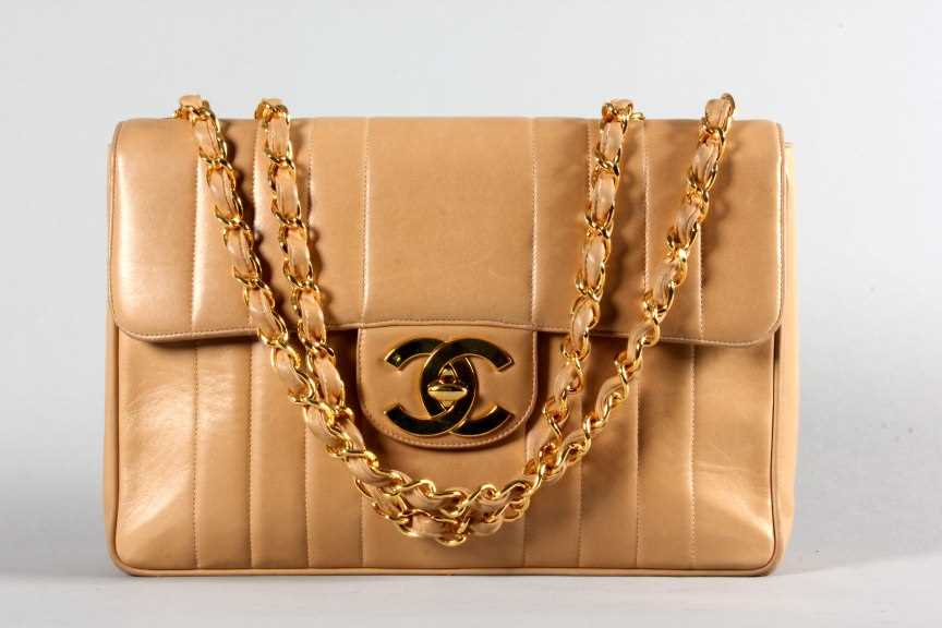 Lot 2 - A fine Chanel tan leather bag, 1980s, with...