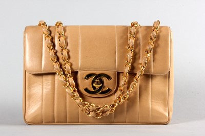 Lot 2 - A fine Chanel tan leather bag, 1980s, with...