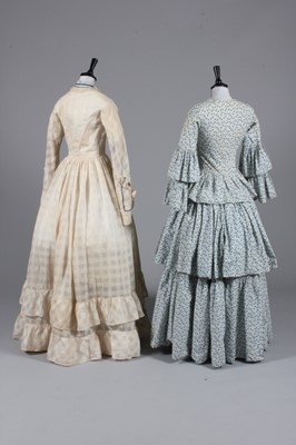 Lot 63 - A printed cotton day dress, circa 1855, with...