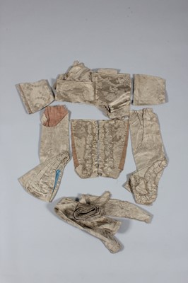 Lot 65 - A mushroom silk damask dress, mid 19th century...