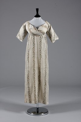 Lot 81 - A printed muslin day dress, circa 1800-1810,...