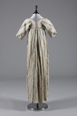 Lot 81 - A printed muslin day dress, circa 1800-1810,...