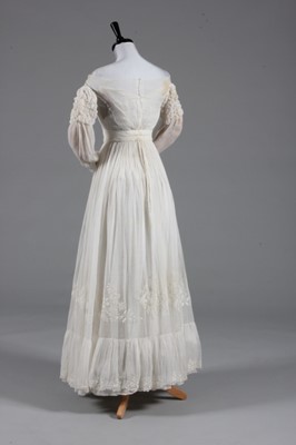 Lot 86 - A whitework embroidered gown, 1830s, with...