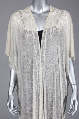 Lot 92 - A fine beaded evening coat, early 1920s, of...