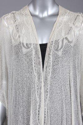 Lot 92 - A fine beaded evening coat, early 1920s, of...