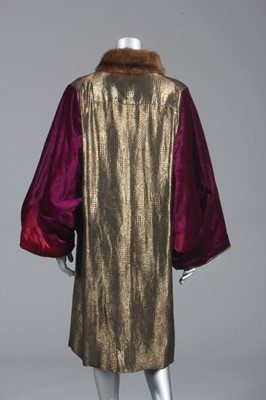 Lot 95 - A magenta velvet and gold lamé evening coat,...