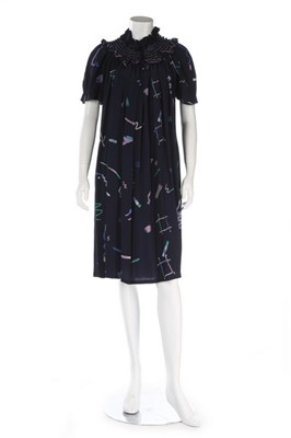 Lot 261 - A navy printed crêpe dress, probably Quorum,...