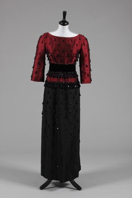 Lot 157 - A Pierre Balmain couture black and wine silk...